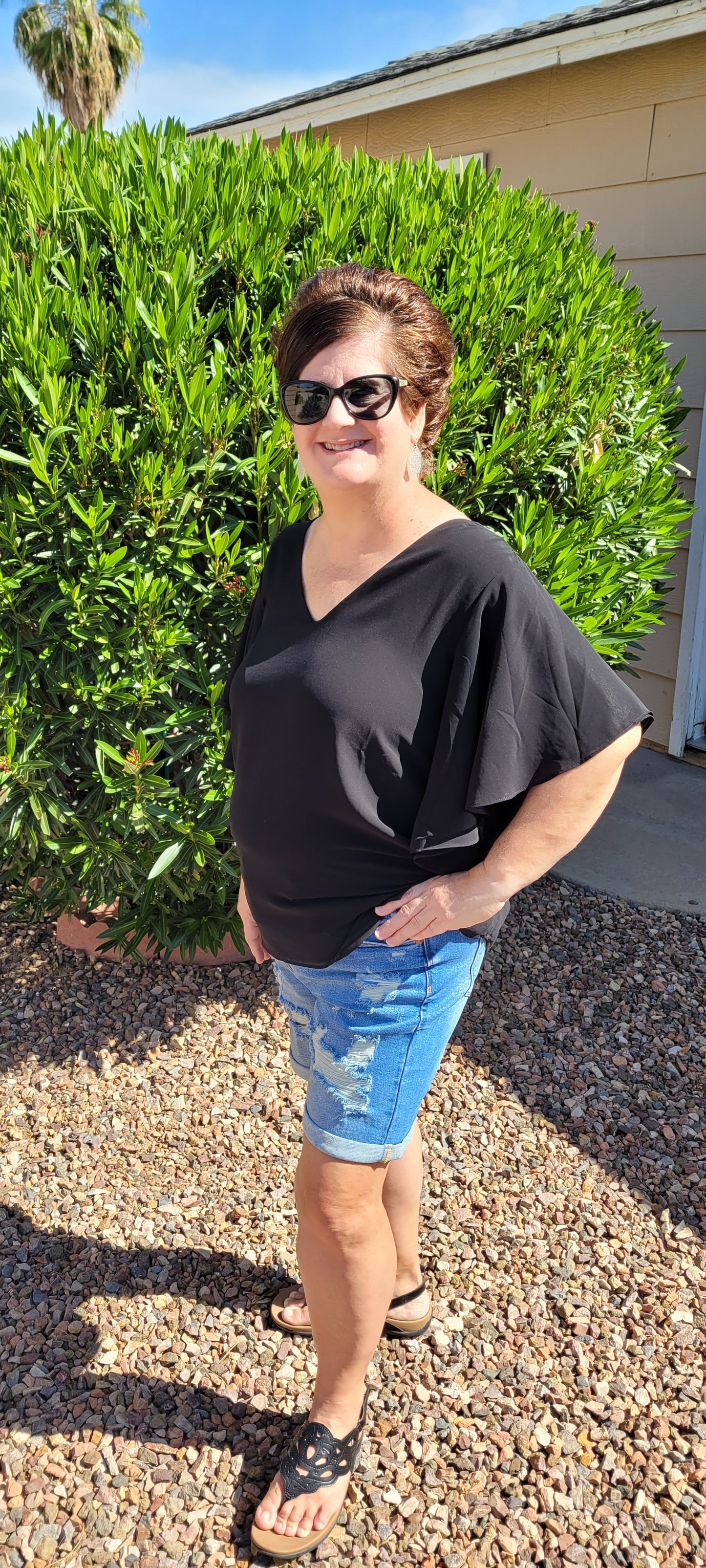 These high waisted, mid- length, distressed shorts feature, cuffed leg, distressed look on front of shorts and the back pockets. These shorts are very stretchy for comfort. A great staple piece for your wardrobe. Go in style girl! You've go this!!
