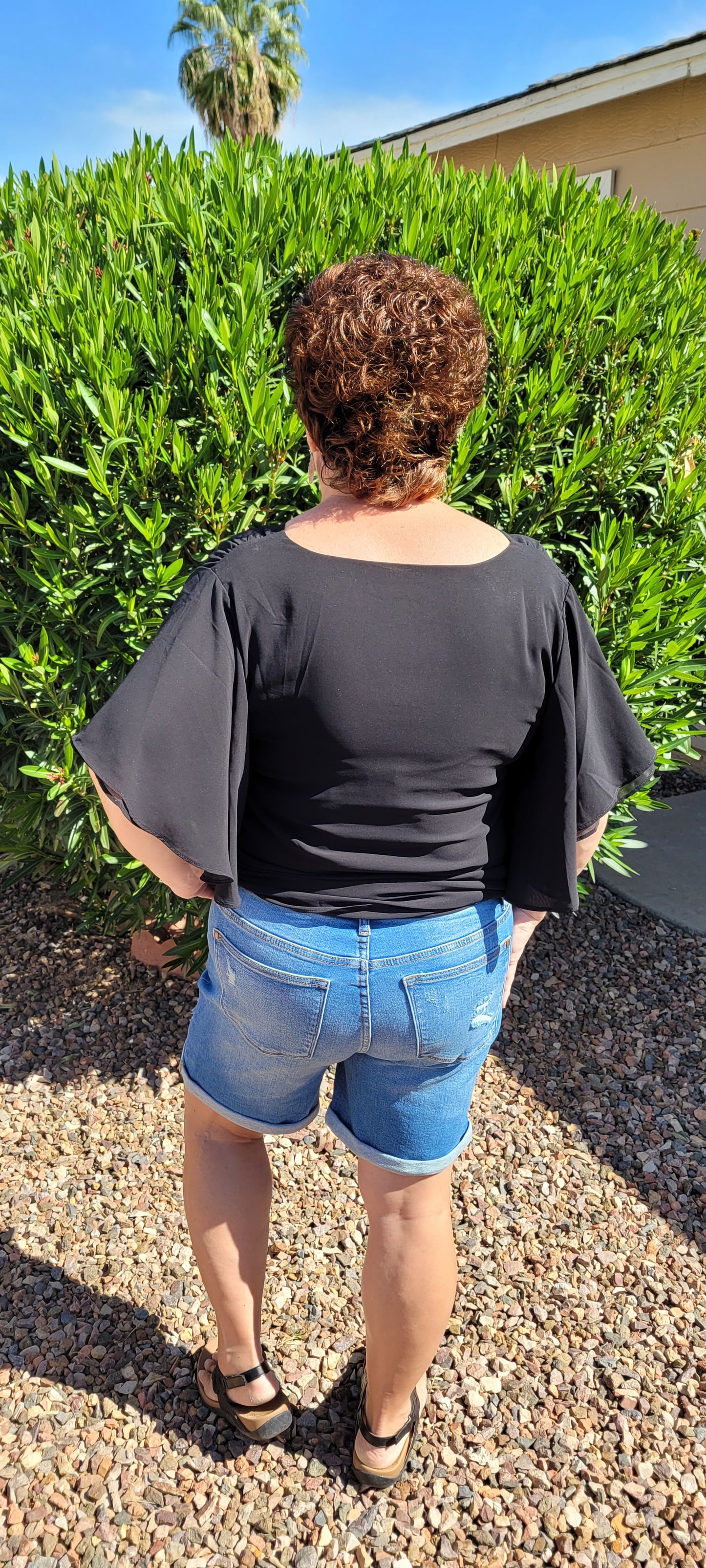 These high waisted, mid- length, distressed shorts feature, cuffed leg, distressed look on front of shorts and the back pockets. These shorts are very stretchy for comfort. A great staple piece for your wardrobe. Go in style girl! You've go this!!