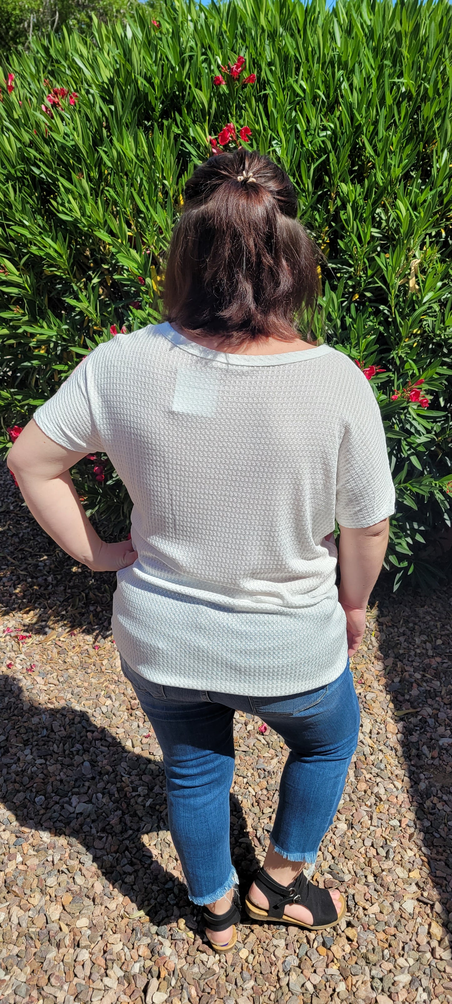 “Spoken From The Heart” is a comfy and casual t-shirt! This short sleeve shirt features pattern blocking, leopard print (pink, gray, white), stripes (coral, white) and solid waffle (white). This shirt has three different materials and textures, and a rounded neckline. Pair with your favorite pair of denim jeans, shorts, or skirt. Sizes small through large.
