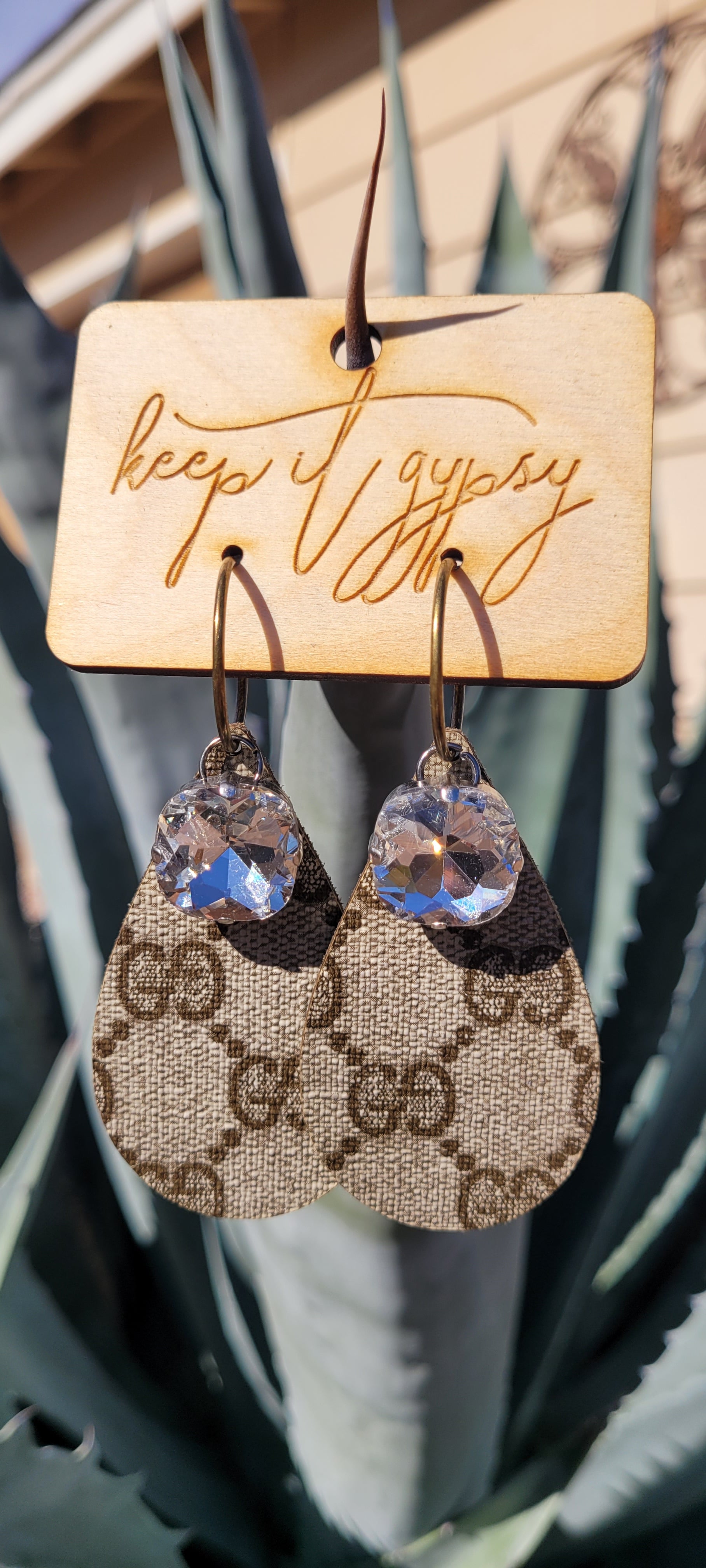 Upcycled Earrings Brown with Clear Crystal  Limited supply!    Due to the nature of leather/suede, small variances of color in the skin may occur, this is in no way considered a defect. These are inherent characteristics of leather/suede and will enhance the individual look of your garment.