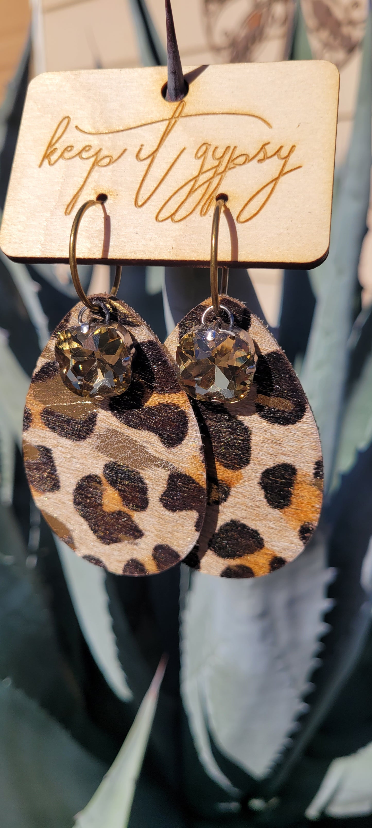 Upcycled Leather Leopard Print Cowhide Earrings Light Gold Crystals Brown, Camel, Black & Metallic Gold Limited supply! Due to the nature of leather/suede, small variances of color in the skin may occur, this is in no way considered a defect. These are inherent characteristics of leather/suede and will enhance the individual look of your garment.