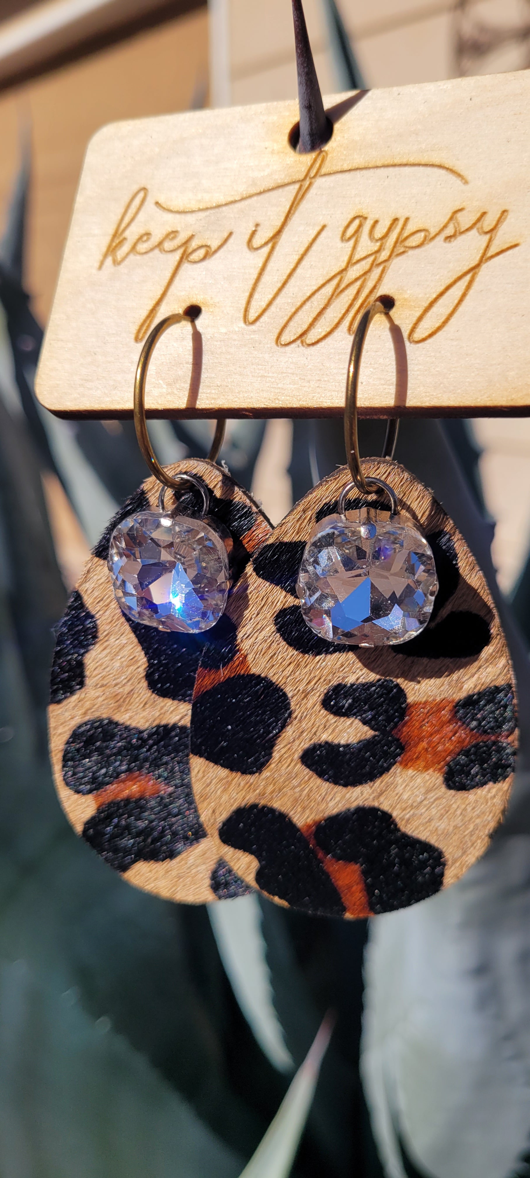 Upcycled Leather Leopard Print Cowhide Earrings Brown, Camel, Black Clear Crystals Limited supply!    Due to the nature of leather/suede, small variances of color in the skin may occur, this is in no way considered a defect. These are inherent characteristics of leather/suede and will enhance the individual look of your garment.
