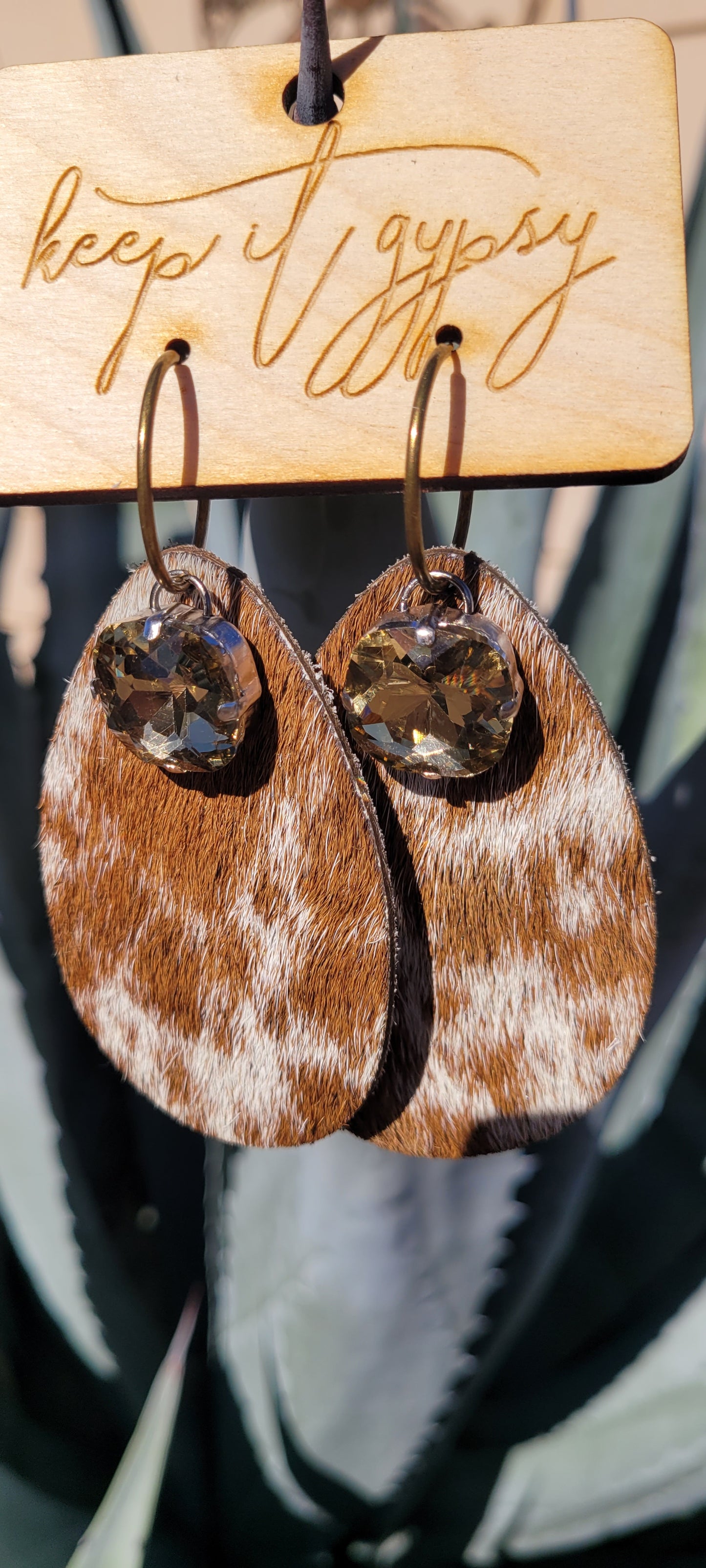Upcycled Cow Print Cowhide Earrings Light Gold Crystals Brown and White Limited supply! Due to the nature of leather/suede, small variances of color in the skin may occur, this is in no way considered a defect. These are inherent characteristics of leather/suede and will enhance the individual look of your garment.