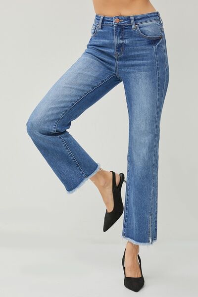 These High Waist Raw Hem Slit Straight Jeans are the ultimate combination of comfort and style. With their high waist design, they provide a flattering and slimming fit. The raw hem and slit details add a touch of edginess and give these jeans a trendy and unique look. Made from high-quality denim, they are durable and built to last.