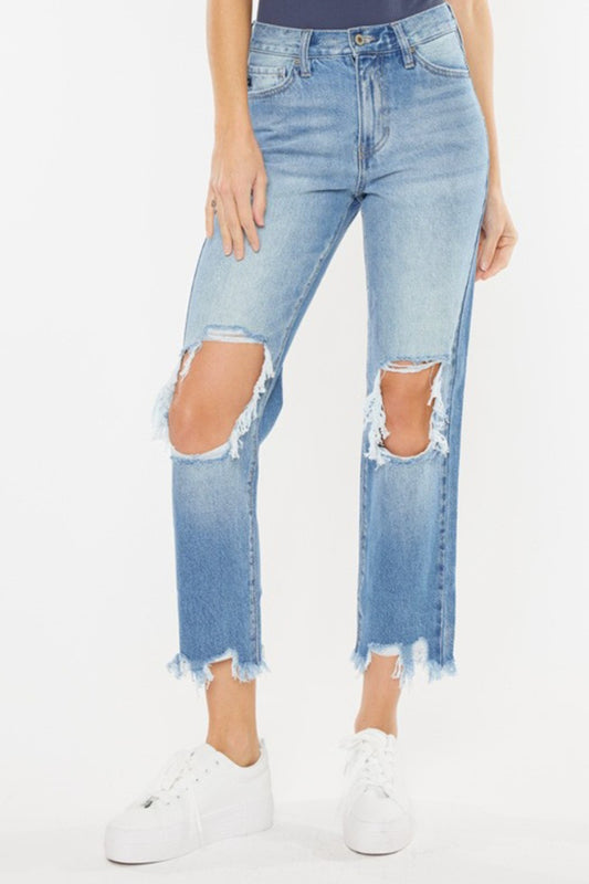 High Waist Chewed Up Straight Mom Jeans are the ultimate combination of vintage-inspired style and trendy edge. These jeans, with their high waistline, provide a flattering and comfortable fit that accentuates your curves.