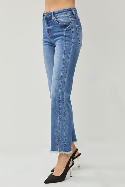 These High Waist Raw Hem Slit Straight Jeans are the ultimate combination of comfort and style. With their high waist design, they provide a flattering and slimming fit. The raw hem and slit details add a touch of edginess and give these jeans a trendy and unique look. Made from high-quality denim, they are durable and built to last.