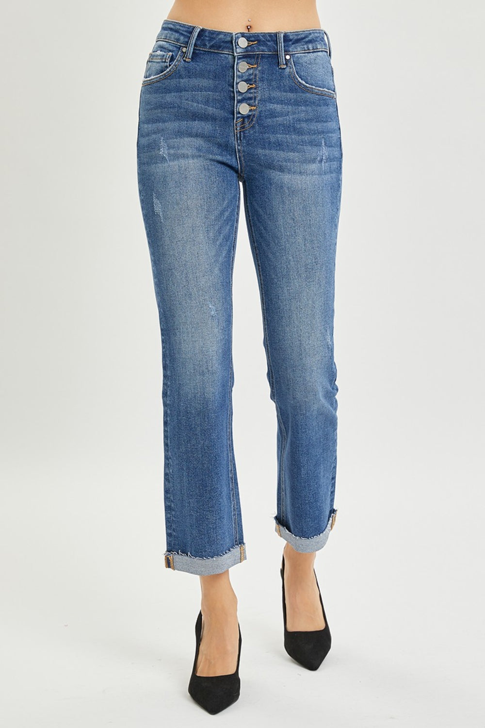 The Button-Fly Cropped Bootcut Jeans are a stylish and modern twist on a classic denim silhouette. The button fly closure adds a retro and chic touch to the cropped bootcut style. Made from high-quality denim fabric, these jeans are durable and comfortable for all-day wear. 0 - 3X