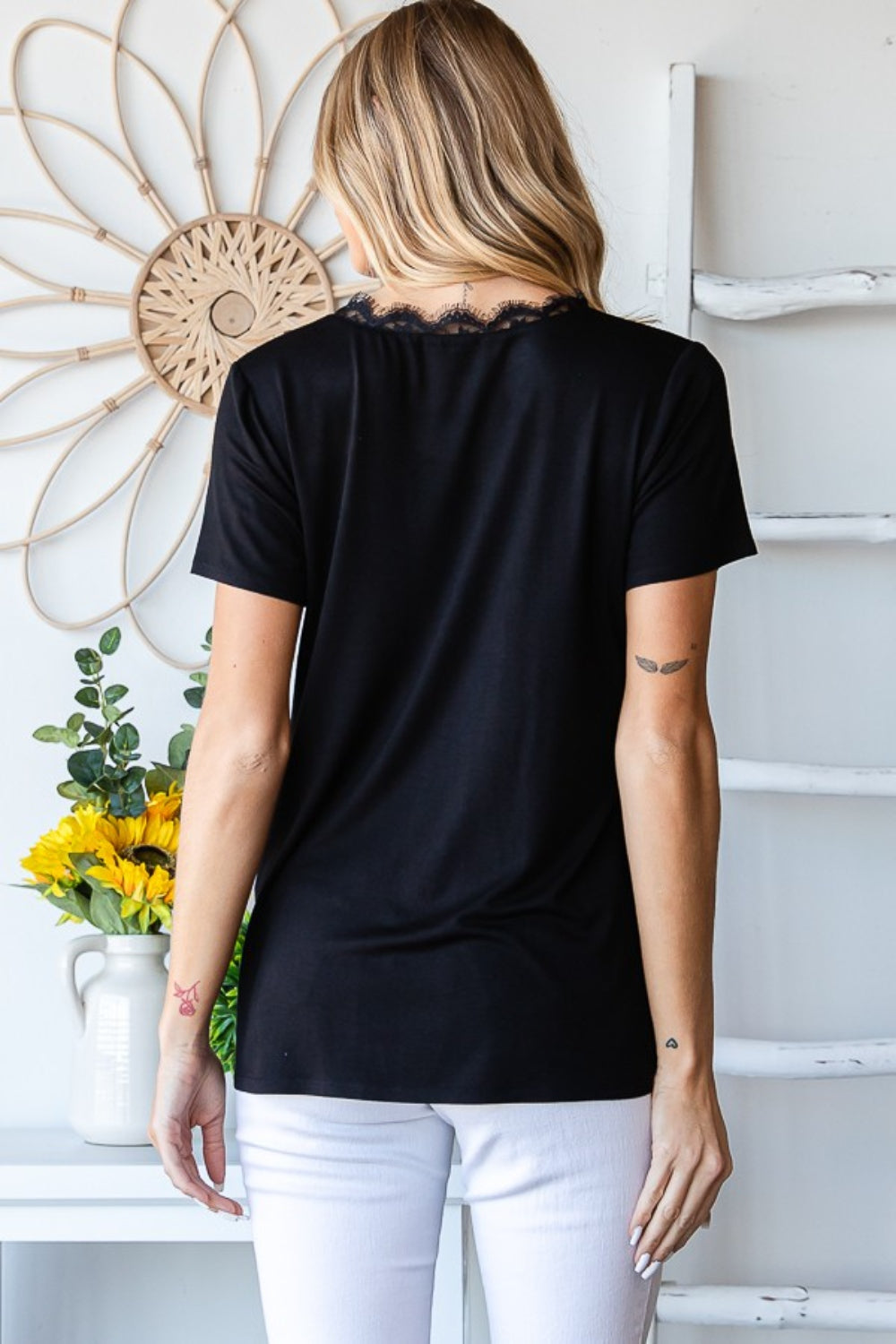 Lace Detail V-Neck Short Sleeve T-Shirt combines casual comfort with feminine elegance. The delicate lace detailing adds a touch of sophistication to the classic V-neck tee, making it perfect for both casual and dressier occasions. This shirt is a versatile and chic addition to any wardrobe, offering a stylish twist on a timeless silhouette. S-L