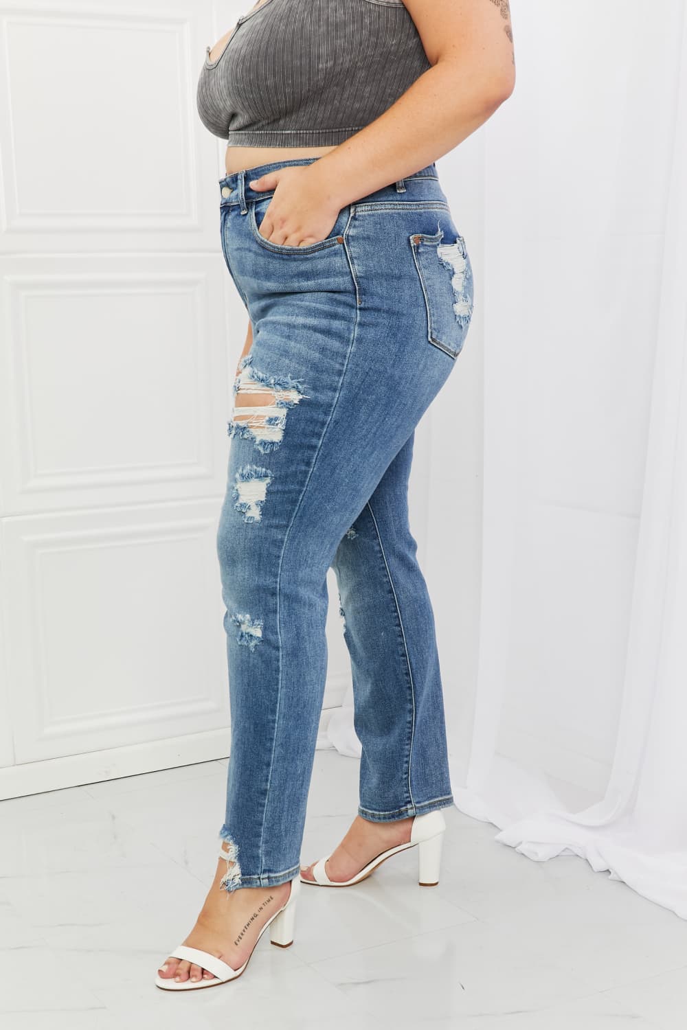 These jeans are the perfect combination of style and comfort, making them a must-have in every fashion-forward individual's wardrobe.The heavy distressing adds a touch of edginess to the classic straight-leg silhouette, making them perfect for a night out with the girls or a casual weekend brunch.
