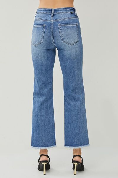 These High Waist Raw Hem Slit Straight Jeans are the ultimate combination of comfort and style. With their high waist design, they provide a flattering and slimming fit. The raw hem and slit details add a touch of edginess and give these jeans a trendy and unique look. Made from high-quality denim, they are durable and built to last.
