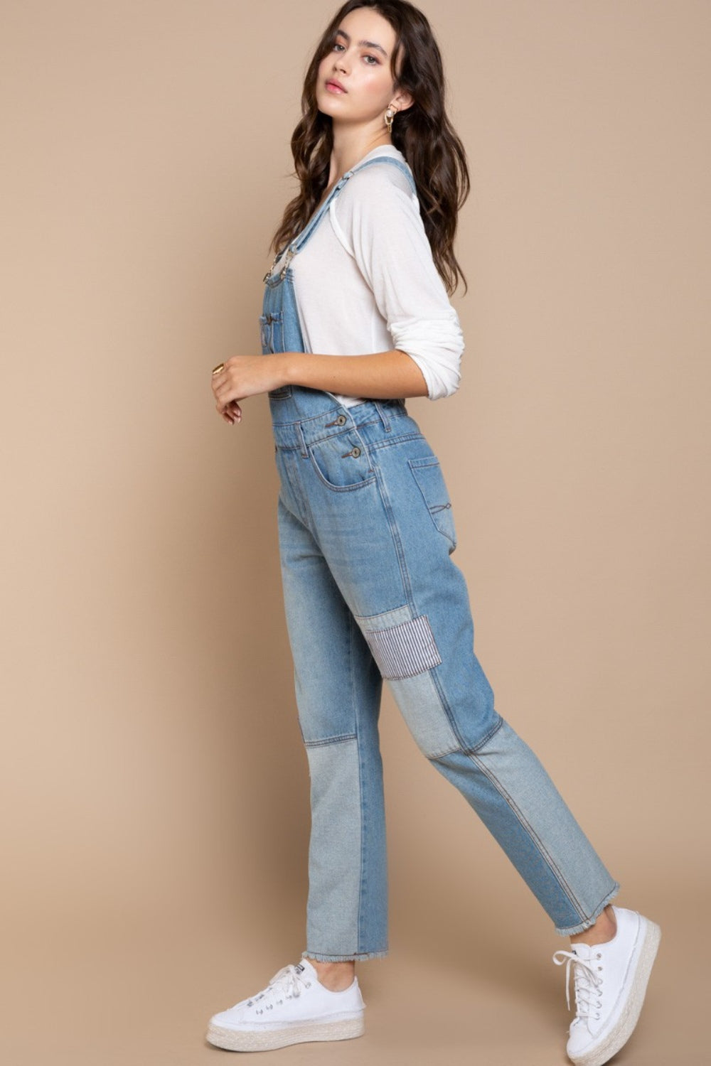 These Front Chest Zipper Slim Leg Denim Overalls are a stylish and modern addition to your wardrobe. The front chest zipper adds a unique and edgy touch to the classic overall design. With slim legs, these overalls provide a flattering silhouette and a sleek look. The denim fabric is durable and versatile, perfect for casual everyday wear. S - L
