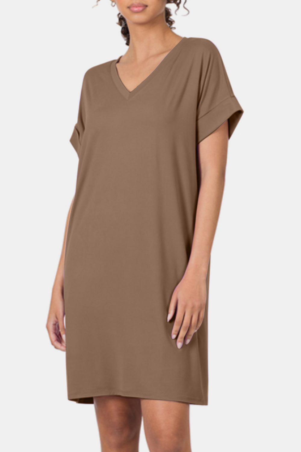The rolled short sleeve V-neck dress is a versatile and stylish addition to your wardrobe. The V-neckline adds a touch of femininity and elegance, while the rolled short sleeves provide a casual and relaxed vibe. S - XL