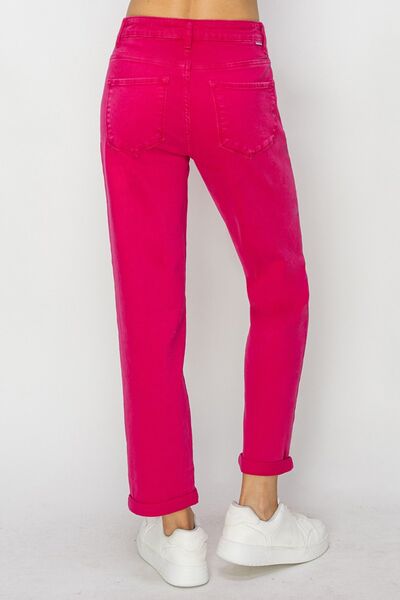 These High Waist Rolled Hem Straight Jeans are the epitome of effortless style and comfort. The high waist design not only flatters and accentuates your curves, but also provides a comfortable fit that stays in place all day long. The rolled hem adds a trendy and casual touch, giving these jeans a relaxed and laid-back vibe.