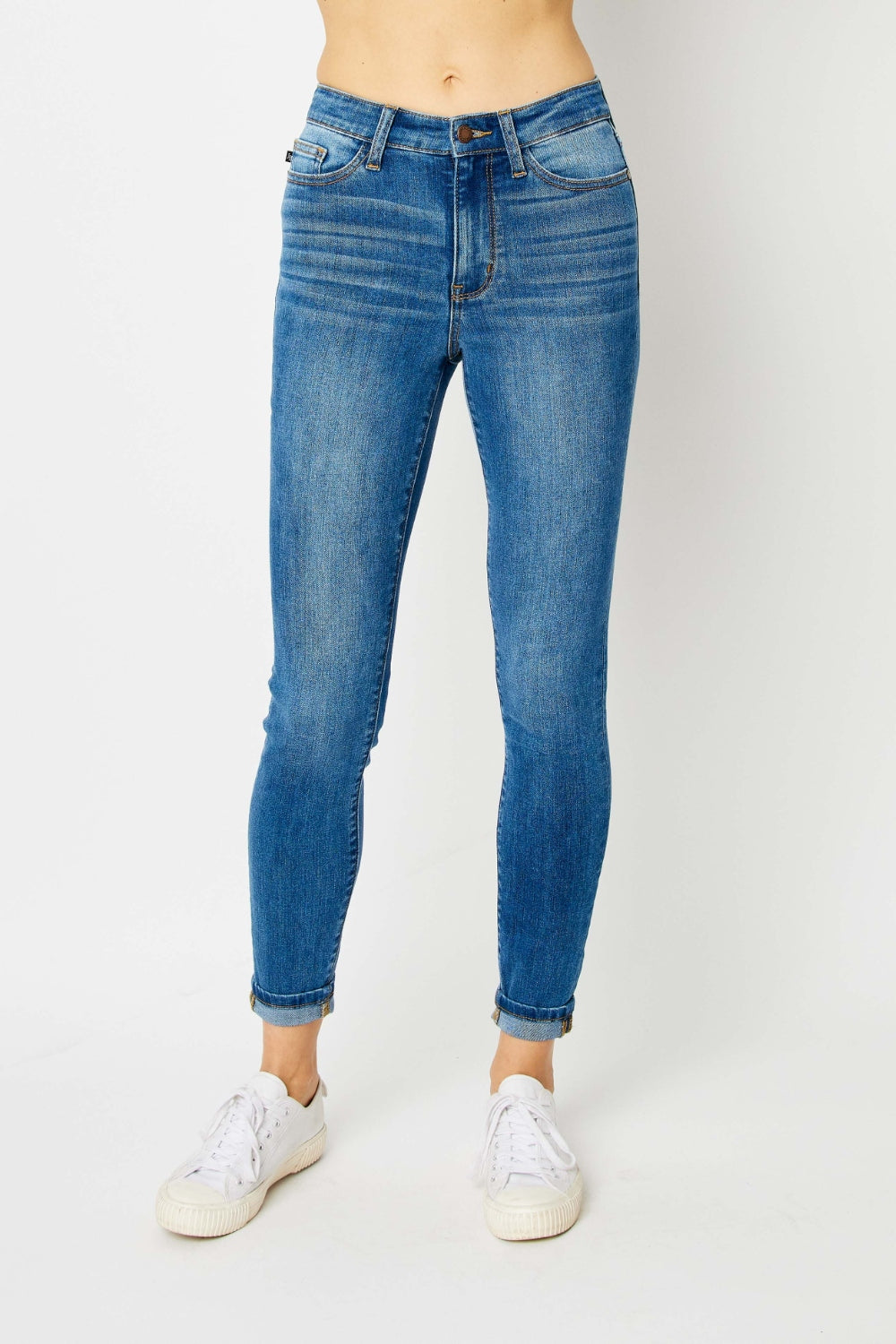 Add a touch of modern flair to your denim collection with these cuffed hem skinny jeans, the perfect balance of style and comfort. The cuffed hem detail gives these skinny jeans a trendy look that is versatile for various outfits. With a flattering slim fit, these jeans hug your curves in all the right places while providing a sleek silhouette. 0 -24W