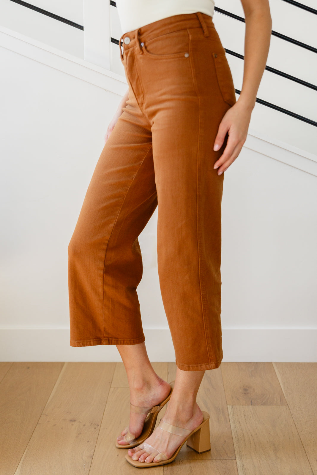 Discover your new favorite jeans with Briar's High Rise Control Top Wide Leg Crop Jeans from Judy Blue. Our triple threat of design, fit, and color come together for maximum style, comfort, and chicness. Features include high rise, tummy control tech, and a wide leg crop in a warm rich garment-dyed camel. Complete with coordinating hardware and you're ready to look and feel amazing! 0 -24W