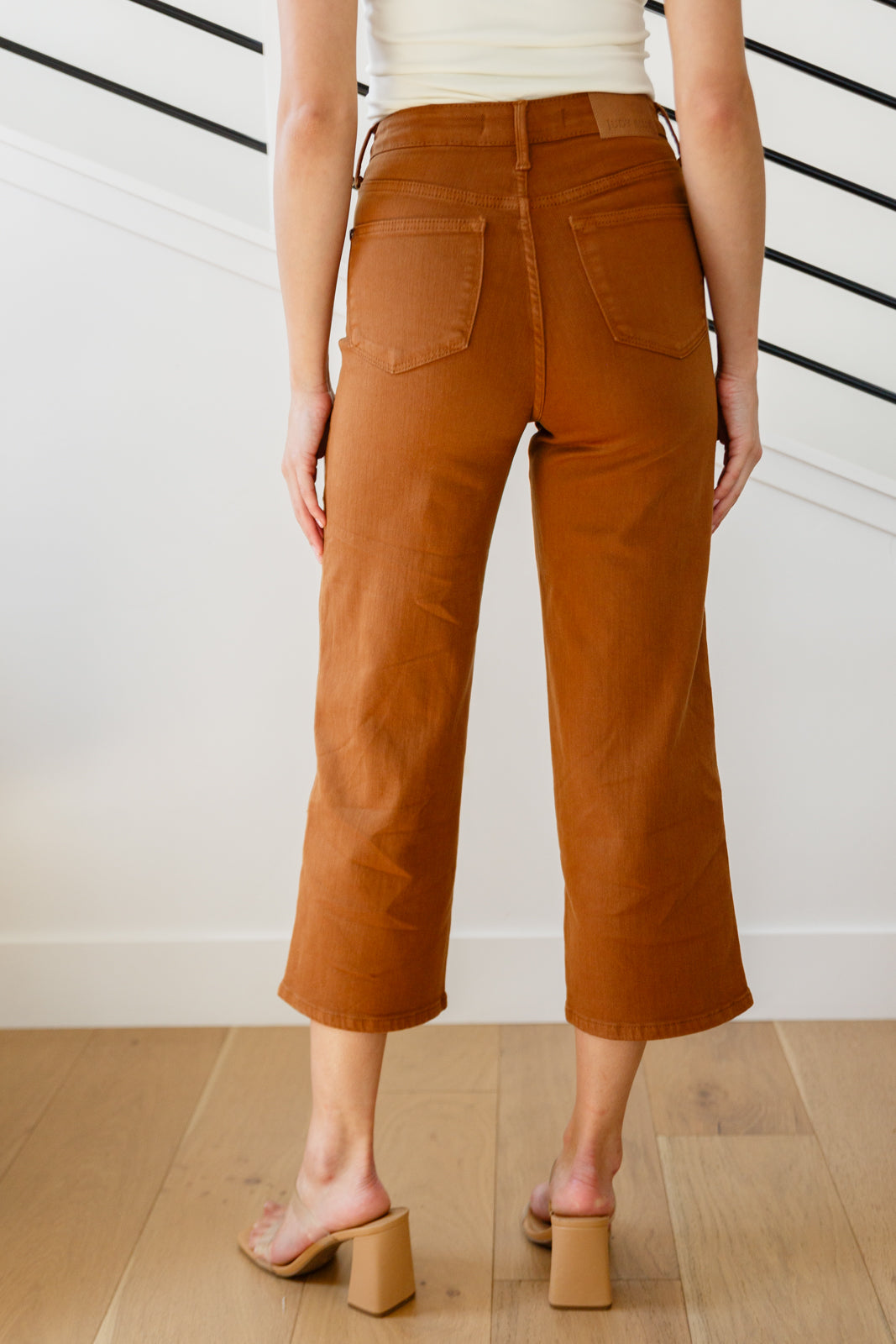 Discover your new favorite jeans with Briar's High Rise Control Top Wide Leg Crop Jeans from Judy Blue. Our triple threat of design, fit, and color come together for maximum style, comfort, and chicness. Features include high rise, tummy control tech, and a wide leg crop in a warm rich garment-dyed camel. Complete with coordinating hardware and you're ready to look and feel amazing! 0 -24W