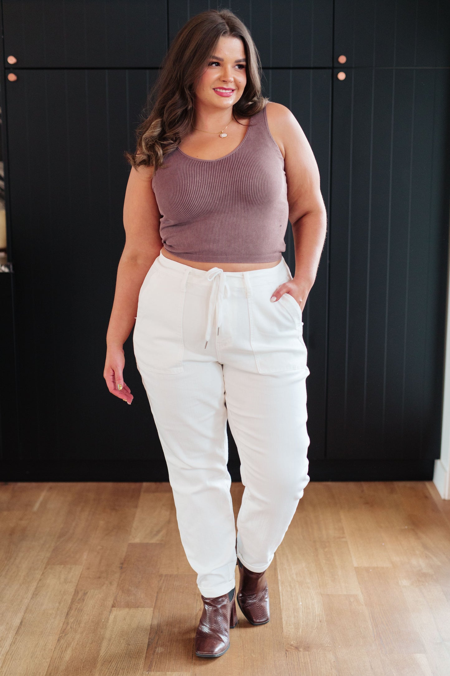 Take your laid-back look up a notch with the Charlene High Rise Jogger from Judy Blue. These versatile jeans highlights a high rise, perfect ecru color, and a drawstring waistband for a comfy fit while the jogger silhouette and optional cuffed hem adds a modern touch to your casual wardrobe. 0 - 24W