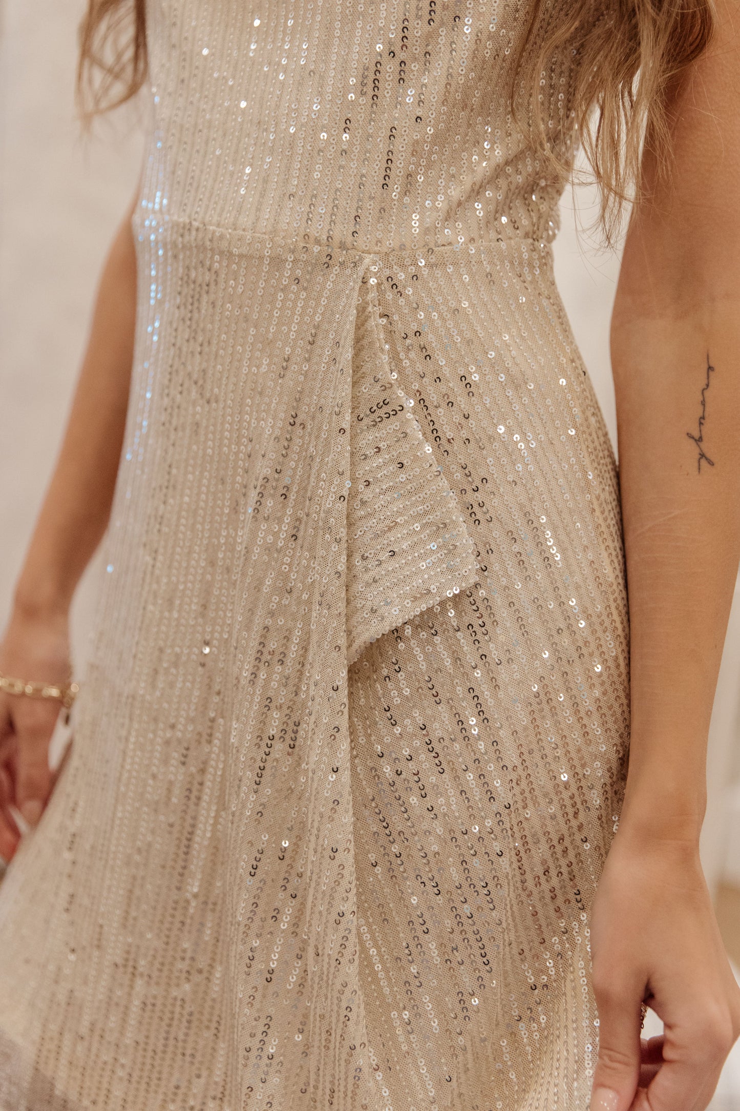Make a head-turning entrance in the Disco Queen Dress! Gold shimmer sequins, folded ruffle detail on the wait line gives you movement and style. Adjustable back straps to fit you perfectly and keep you shining all night long! S - 3X