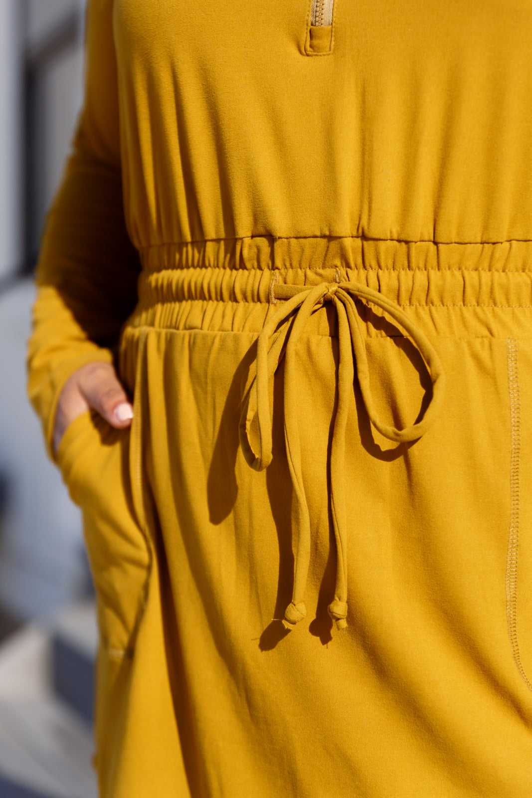 Retire those uncomfortable last season rompers with our Getting Out Long Sleeve Hoodie Romper. Made with brushed microfiber, this romper is super soft and breathable, perfect for all-day wear. The hood and drawstring waistline add a touch of style, while the patch pockets and lined shorts provide convenience.