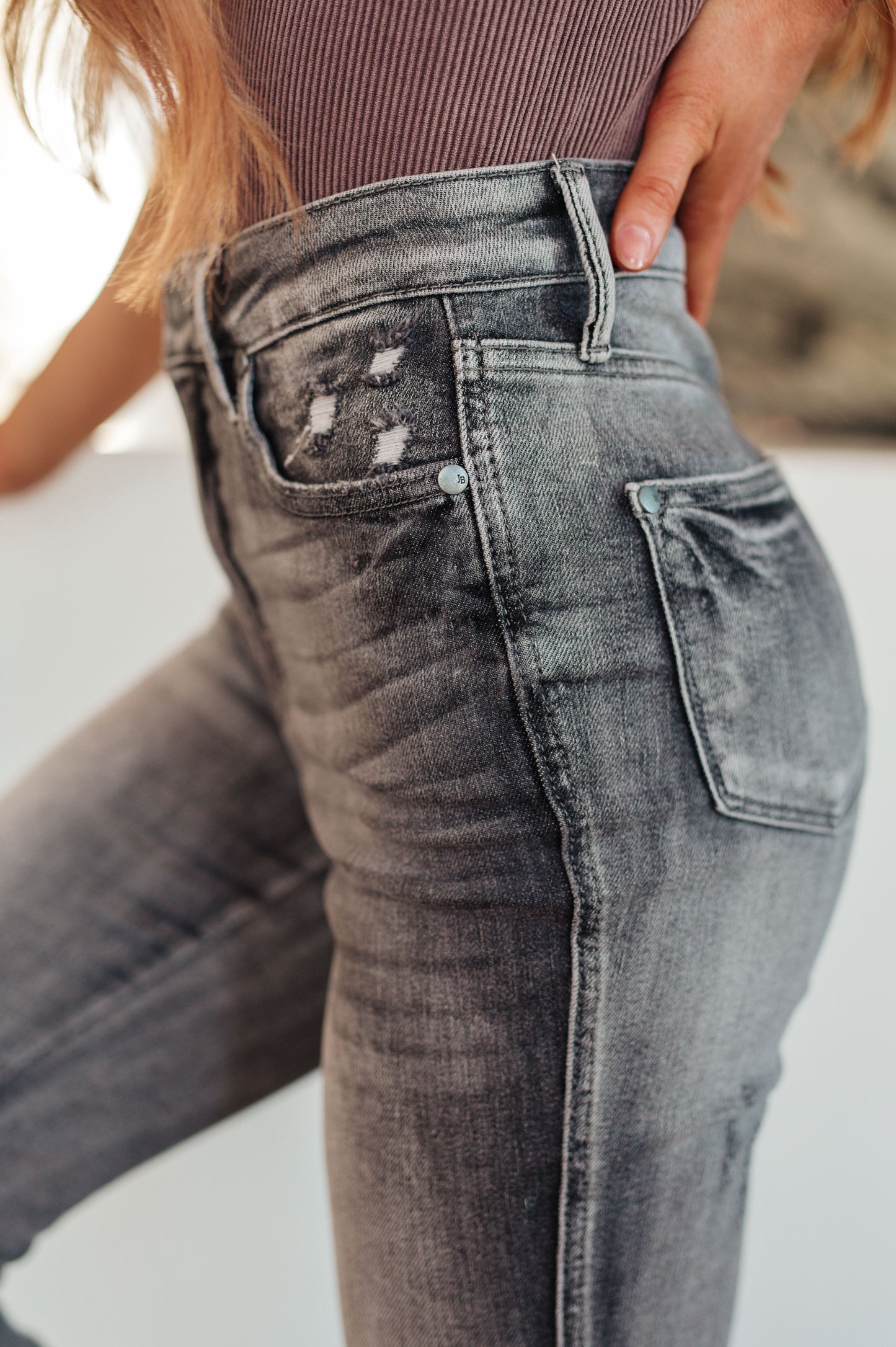 Get ready for a stylish and comfortable fit with our Hadley High Rise Control Top Release Hem Skinny Jeans from Judy Blue! Our tummy control technology will give you a flattering silhouette, while the released hem adds a trendy touch to the washed out gray color. Elevate your wardrobe today! 0 - 24W