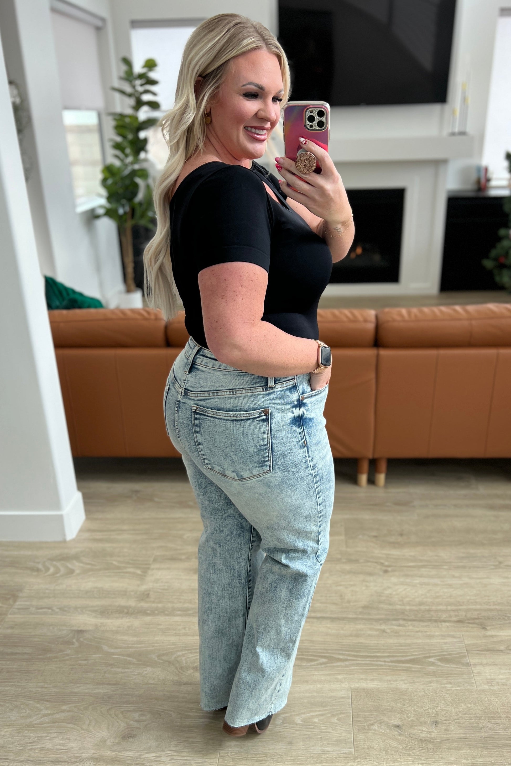 Get ready to elevate your denim game with our Dory High Waist Mineral Wash Raw Hem Wide Leg Jeans from Judy Blue. Designed for comfort with 4-way stretch and a high rise waist, these jeans will give you the perfect fit every time. The mineral wash and raw hem add a touch of style for a versatile and on-trend look 0 -24W