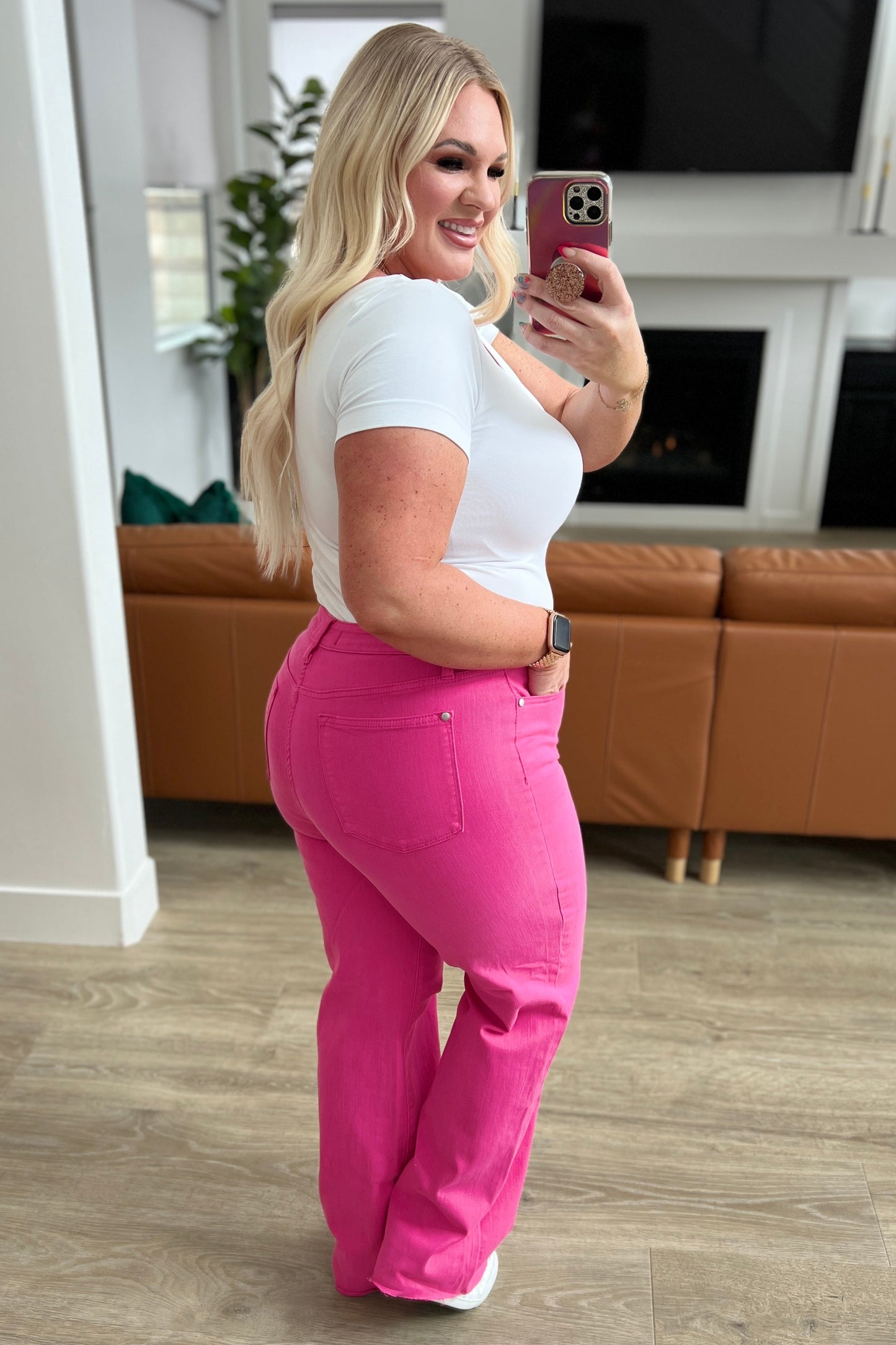 The bright pink garment dye adds a fun pop of color, and the adorable pink heart embroidered on the back pocket adds a touch of charm. Finished with a raw hem for an effortlessly cool look. Elevate your denim game with these must-have jeans. Judy Blue 0 -24W