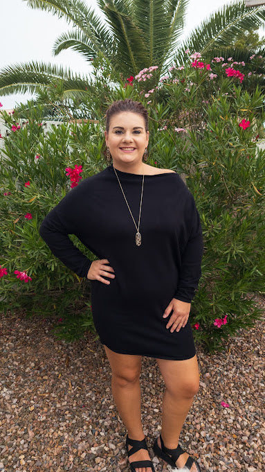Wear this beautiful piece as a top or a dress. Pair with your favorite leggings, denim jeans or skirt. This is a great staple piece, as black is easy to dress up or down. You will look stunning showing off your flattering figure in this sexy number! When you look good, you feel good! It is so soft and comfy. This is an off the shoulder dress, with long sleeves, fitted bottom hemline. Color is black. Sizes small through large.