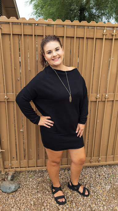 Wear this beautiful piece as a top or a dress. Pair with your favorite leggings, denim jeans or skirt. This is a great staple piece, as black is easy to dress up or down. You will look stunning showing off your flattering figure in this sexy number! When you look good, you feel good! It is so soft and comfy. This is an off the shoulder dress, with long sleeves, fitted bottom hemline. Color is black. Sizes small through large.