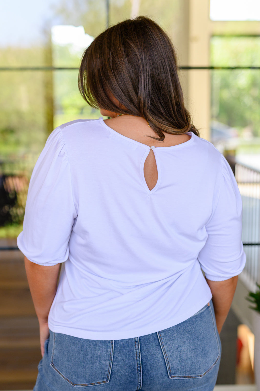 Look your best in the timelessly chic New Days Ahead White Blouse. Featuring a puff sleeve, a keyhole detail on the back, a classic white hue, and a comfortable jersey knit, this top is sure to be your new go-to for any occasion. S - 3X