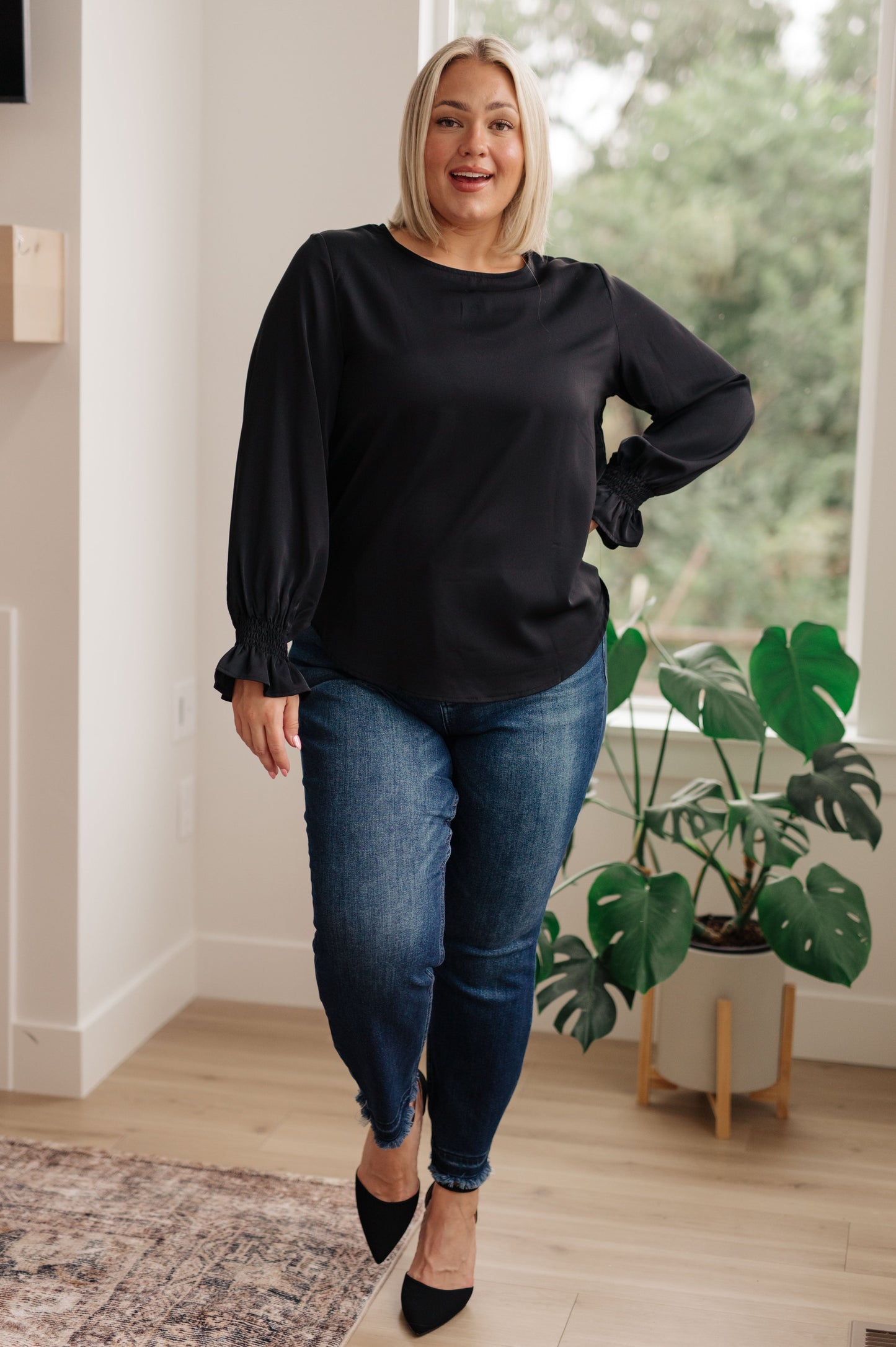Look and feel your best, no matter the occasion, with our Peaceful Moments Smocked Sleeve Blouse. This go-to blouse has a smocked elastic sleeve cuff for a cool ruffled accent, easily transitioning from office to date night. A wardrobe staple that will take you places! S - 3X