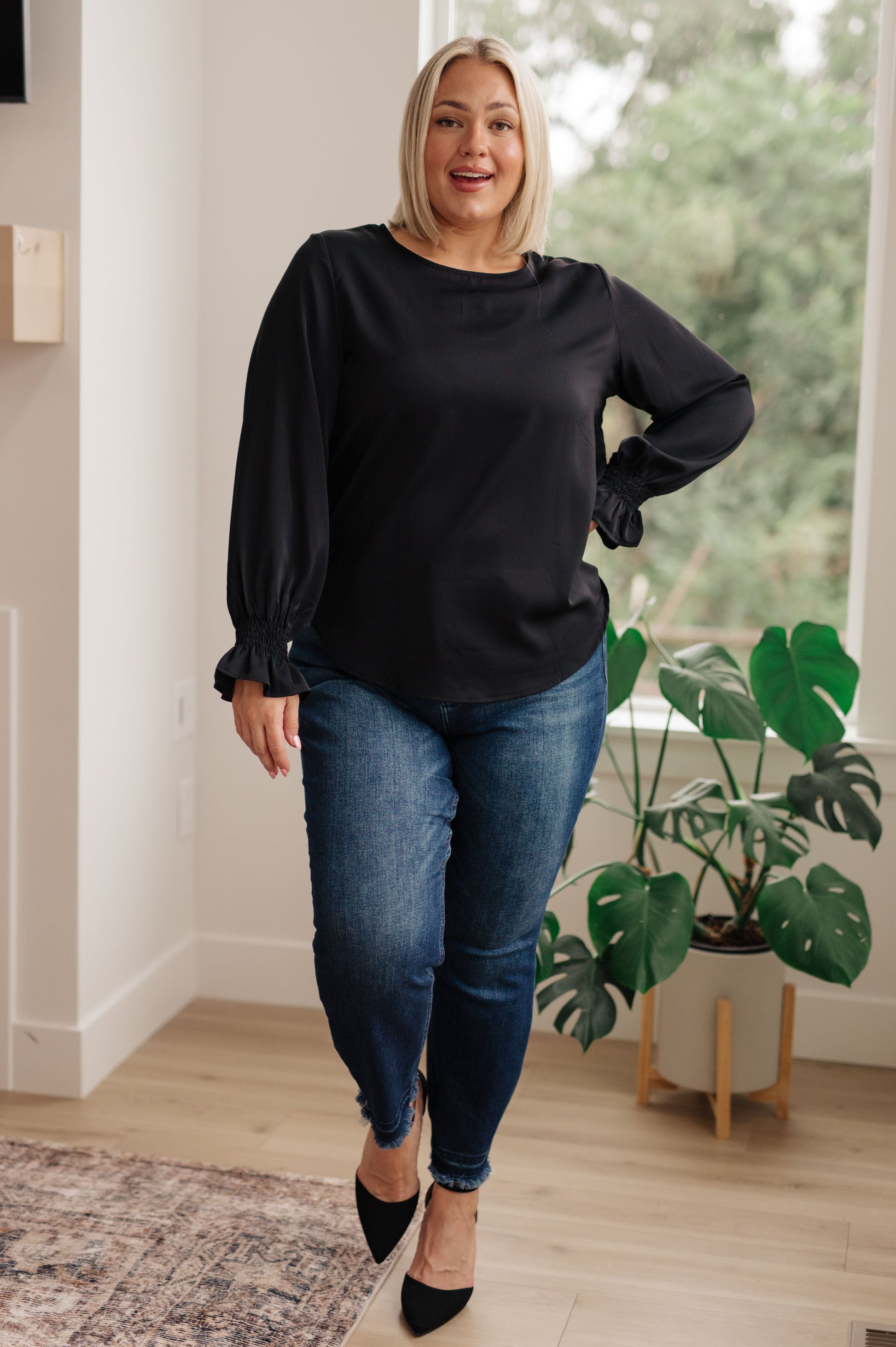 Look and feel your best, no matter the occasion, with our Peaceful Moments Smocked Sleeve Blouse. This go-to blouse has a smocked elastic sleeve cuff for a cool ruffled accent, easily transitioning from office to date night. A wardrobe staple that will take you places! S - 3X
