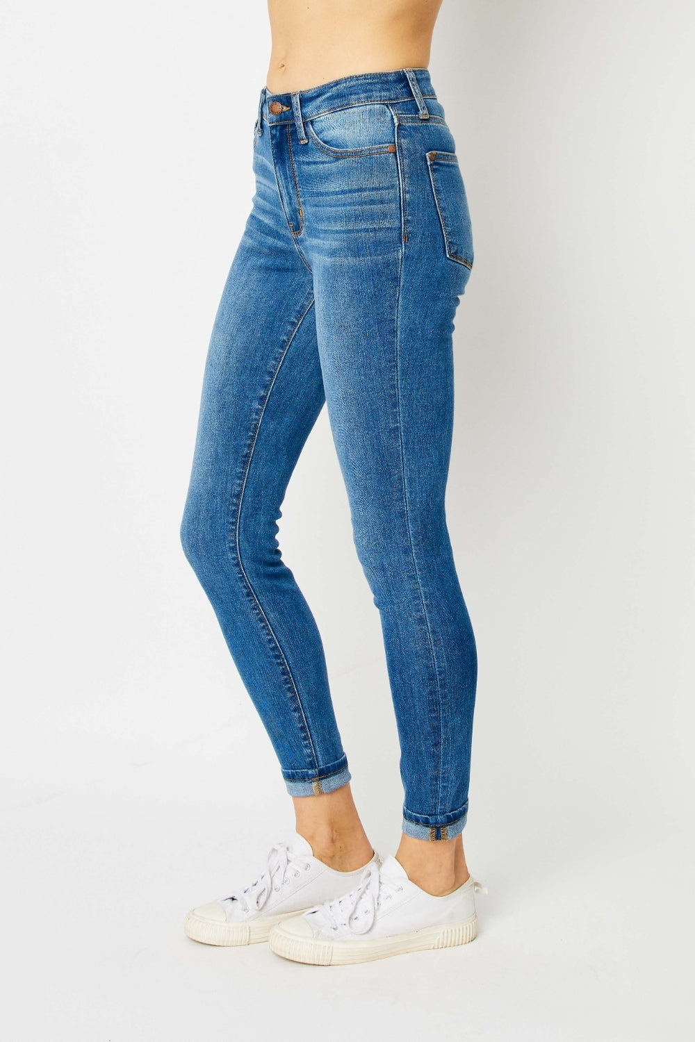 Add a touch of modern flair to your denim collection with these cuffed hem skinny jeans, the perfect balance of style and comfort. The cuffed hem detail gives these skinny jeans a trendy look that is versatile for various outfits. With a flattering slim fit, these jeans hug your curves in all the right places while providing a sleek silhouette. 0 - 24W