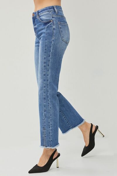 These High Waist Raw Hem Slit Straight Jeans are the ultimate combination of comfort and style. With their high waist design, they provide a flattering and slimming fit. The raw hem and slit details add a touch of edginess and give these jeans a trendy and unique look. Made from high-quality denim, they are durable and built to last.