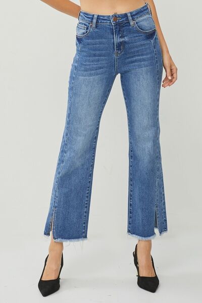 These High Waist Raw Hem Slit Straight Jeans are the ultimate combination of comfort and style. With their high waist design, they provide a flattering and slimming fit. The raw hem and slit details add a touch of edginess and give these jeans a trendy and unique look. Made from high-quality denim, they are durable and built to last.