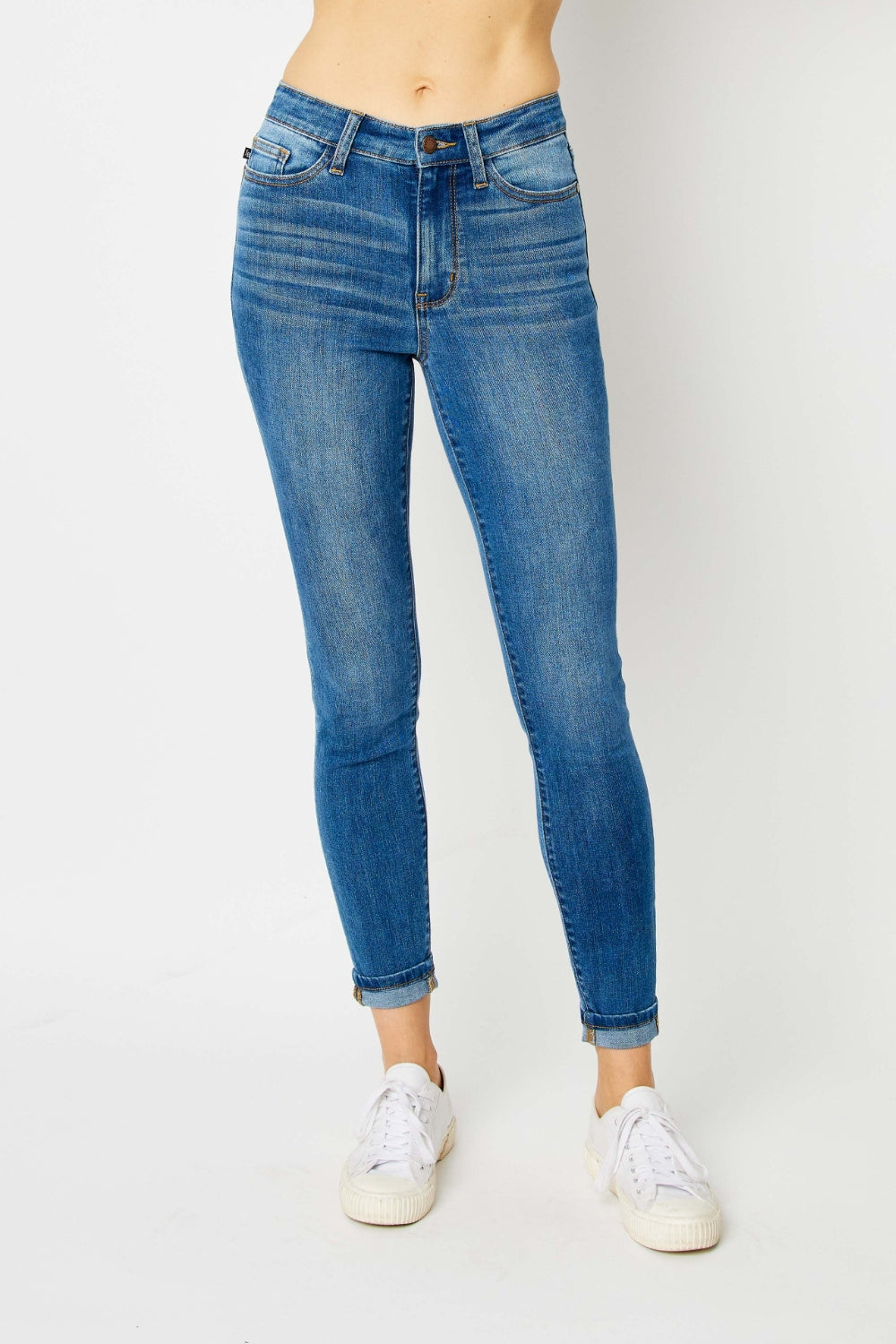 Add a touch of modern flair to your denim collection with these cuffed hem skinny jeans, the perfect balance of style and comfort. The cuffed hem detail gives these skinny jeans a trendy look that is versatile for various outfits. With a flattering slim fit, these jeans hug your curves in all the right places while providing a sleek silhouette. 0 - 24W