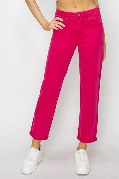 These High Waist Rolled Hem Straight Jeans are the epitome of effortless style and comfort. The high waist design not only flatters and accentuates your curves, but also provides a comfortable fit that stays in place all day long. The rolled hem adds a trendy and casual touch, giving these jeans a relaxed and laid-back vibe. 