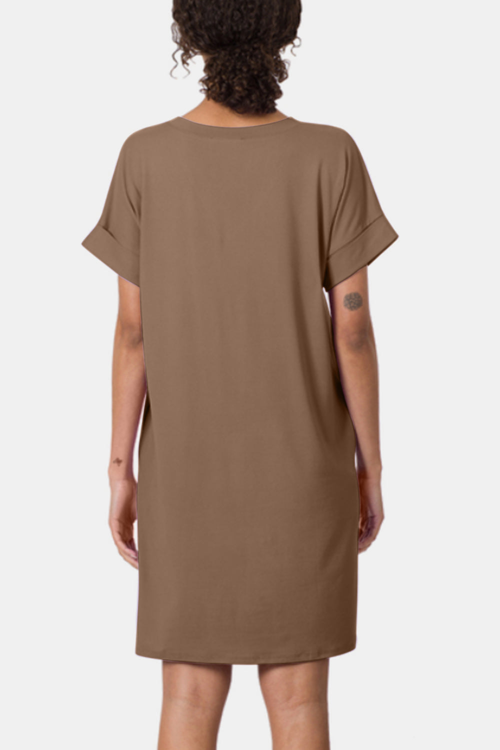 The rolled short sleeve V-neck dress is a versatile and stylish addition to your wardrobe. The V-neckline adds a touch of femininity and elegance, while the rolled short sleeves provide a casual and relaxed vibe. S - XL