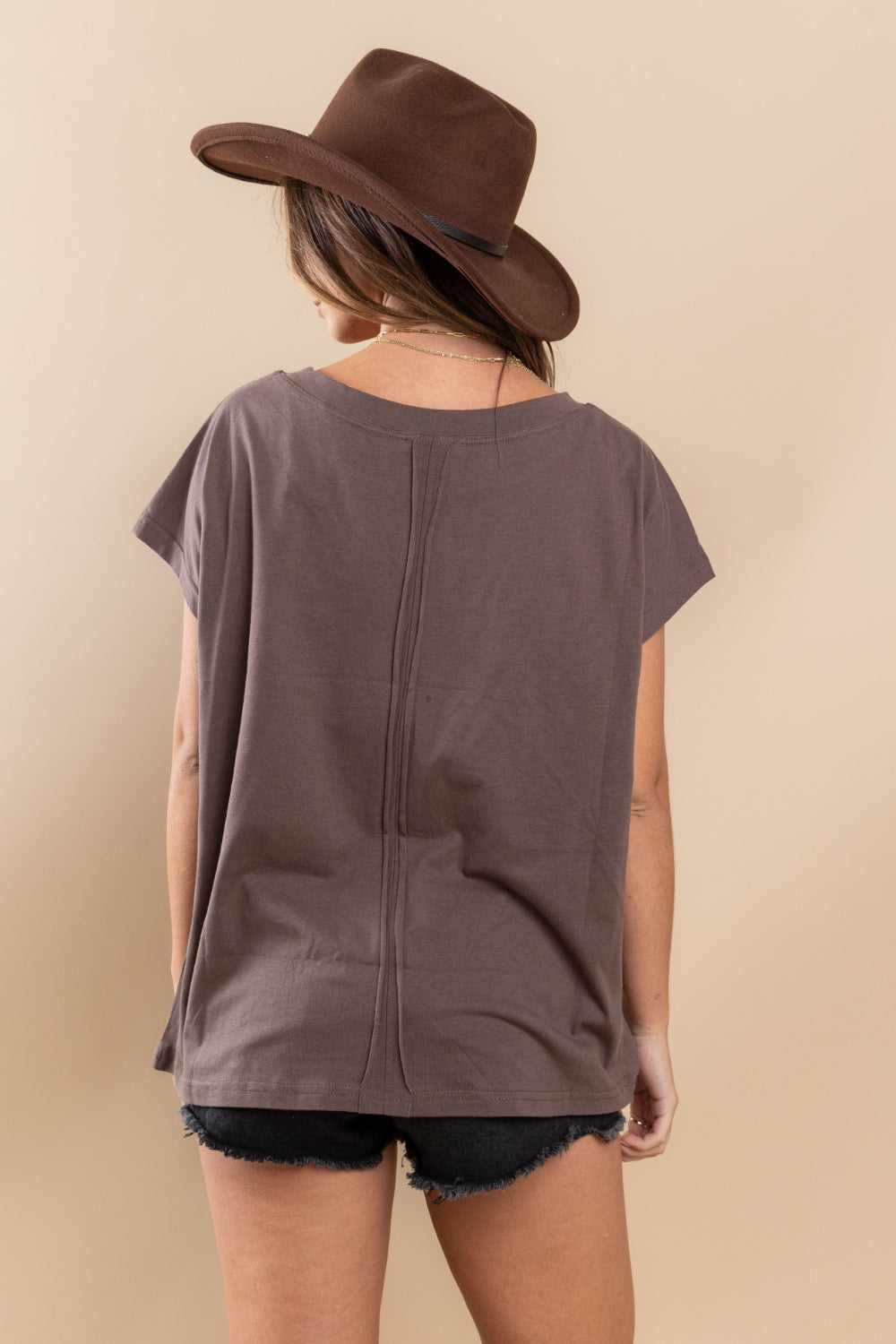 The Fringe Detail Round Neck Short Sleeve Top is a trendy and stylish addition to any wardrobe. The fringe detailing adds a fun and playful touch to this classic silhouette S - L