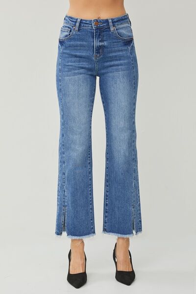 These High Waist Raw Hem Slit Straight Jeans are the ultimate combination of comfort and style. With their high waist design, they provide a flattering and slimming fit. The raw hem and slit details add a touch of edginess and give these jeans a trendy and unique look. Made from high-quality denim, they are durable and built to last.