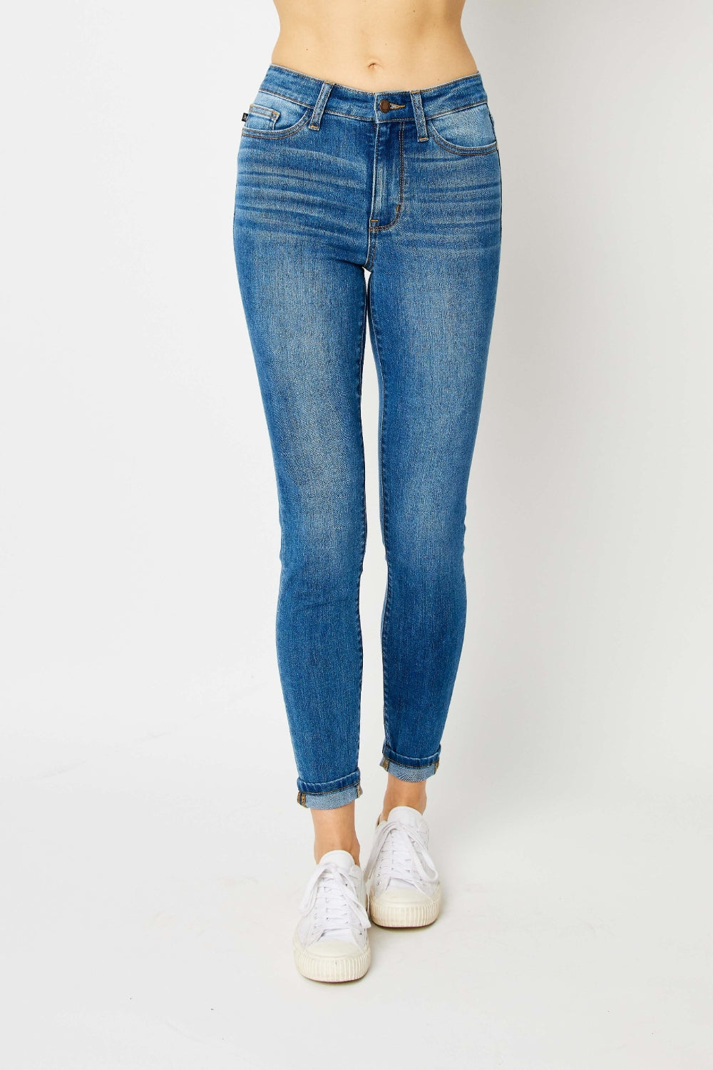 Add a touch of modern flair to your denim collection with these cuffed hem skinny jeans, the perfect balance of style and comfort. The cuffed hem detail gives these skinny jeans a trendy look that is versatile for various outfits. With a flattering slim fit, these jeans hug your curves in all the right places while providing a sleek silhouette. 0 - 24W