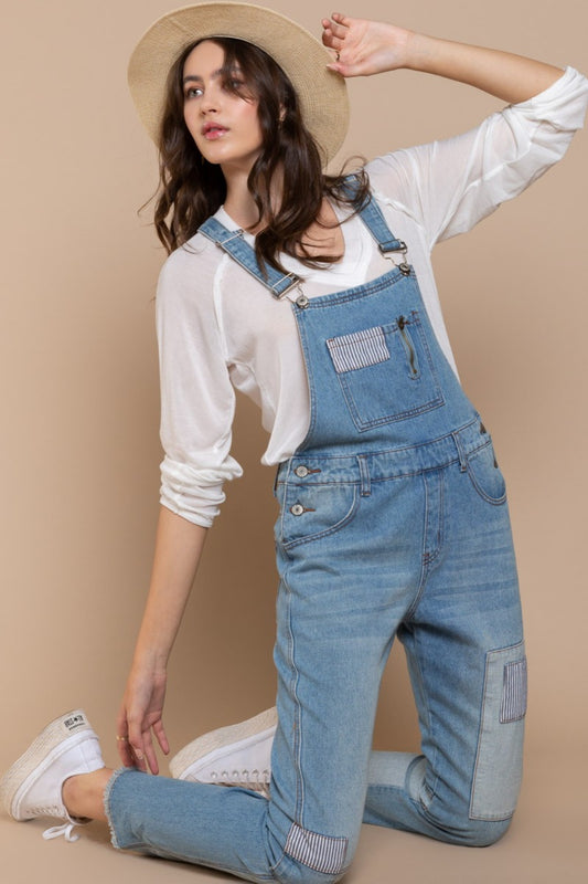 These Front Chest Zipper Slim Leg Denim Overalls are a stylish and modern addition to your wardrobe. The front chest zipper adds a unique and edgy touch to the classic overall design. With slim legs, these overalls provide a flattering silhouette and a sleek look. The denim fabric is durable and versatile, perfect for casual everyday wear. S - L