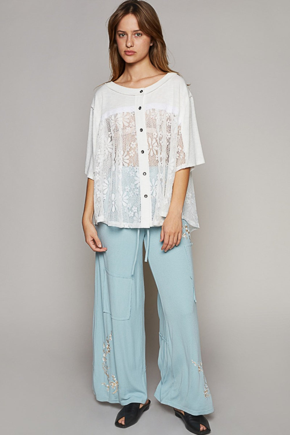 This Round Neck Short Sleeve Lace Top is a delicate and elegant addition to your wardrobe. The lace detailing adds a touch of romance and femininity to the top, making it perfect for both casual and dressy occasions. With a classic round neck design, this top is flattering and versatile. S - L