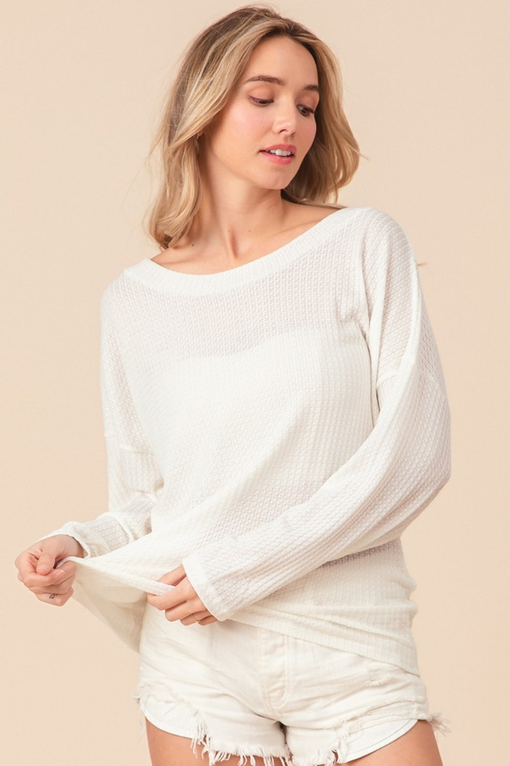 The Waffled Backless Drawstring Top is a flirty and stylish choice for your summer wardrobe. Featuring a waffled texture, this top adds depth and interest to your look. The backless design with a drawstring detail creates a playful and alluring silhouette. 