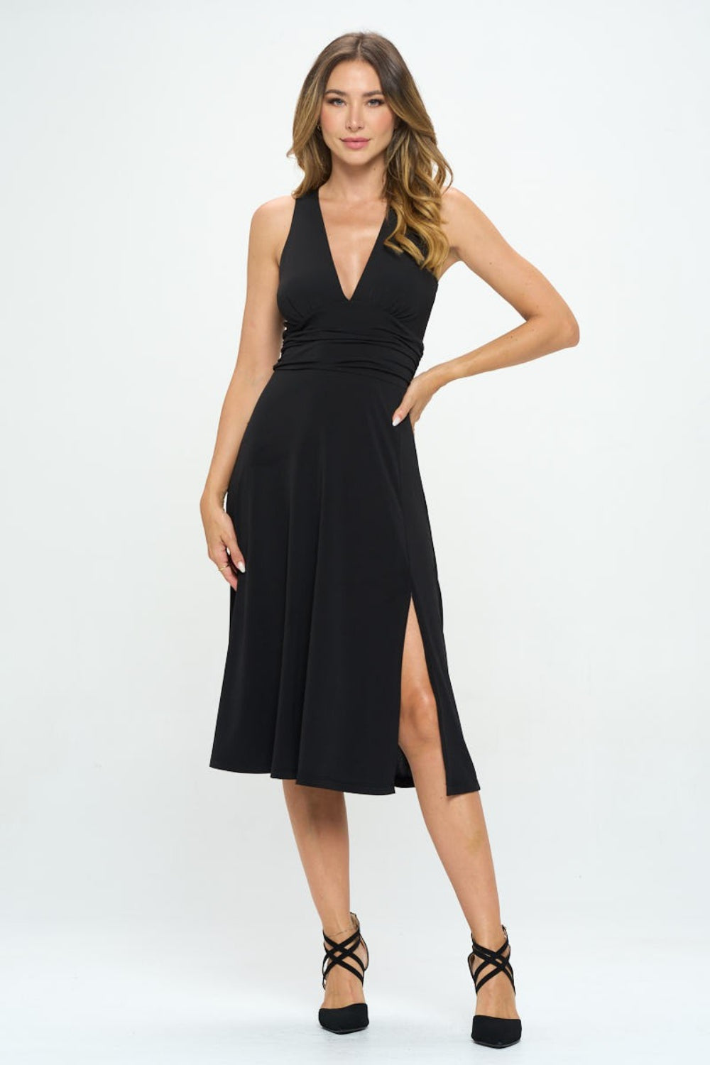 This ruched waist sleeveless slit dress is a stunning and versatile piece for any occasion. The ruched waist detailing creates a flattering silhouette by accentuating your curves. The sleeveless design is perfect for warmer weather, while the slit adds a touch of allure and movement.