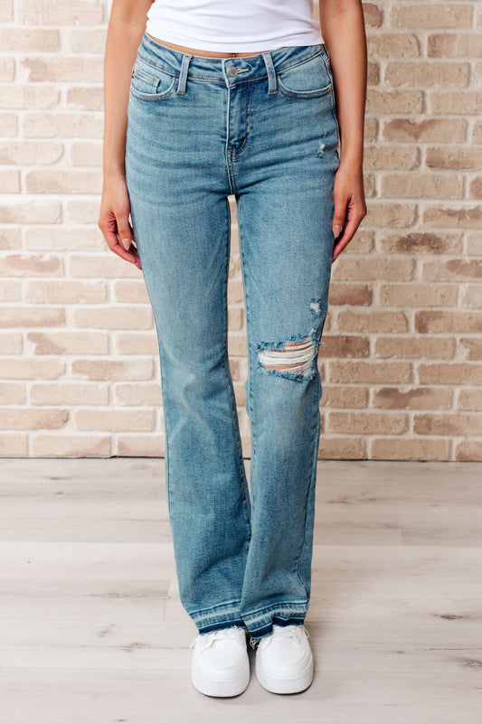 Judy Blue
Mid Rise
Zip Fly
Medium Wash
Distressed
Released Raw Hem
Bootcut Silhouette

94% Cotton, 5% Polyester, 1% Spandex
True to Judy Blue Sizing