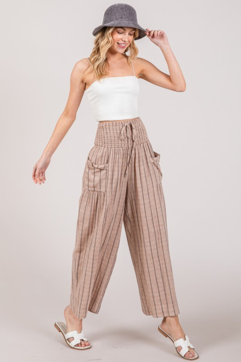 The Cotton Gauze Wash Stripe Pants are a comfortable and stylish choice for a casual and laid-back look. These pants feature a breathable cotton gauze fabric with a washed stripe pattern, adding a touch of texture and interest to your outfit. 