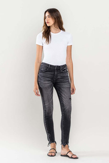 These raw hem cropped skinny jeans are a must-have for any fashion-forward individual. The raw hem adds a touch of edge to the classic skinny jeans silhouette. The cropped length is perfect for showcasing your favorite footwear. 24-32