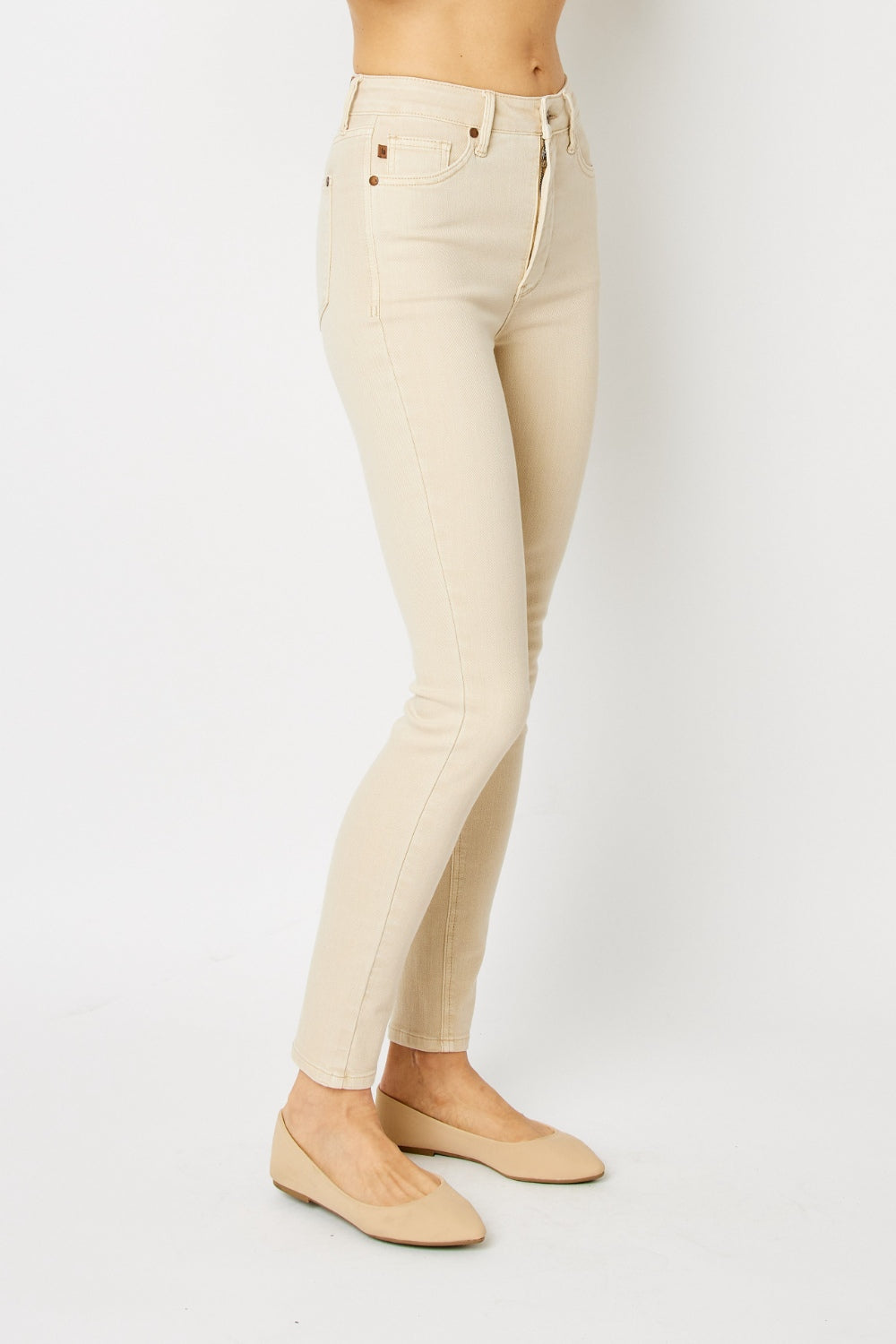 Introducing our new Garment Dyed Tummy Control Skinny Jeans. These jeans are designed to give you an effortlessly slim and flattering look. With their high-rise waist and tummy control panel, they provide the perfect amount of support and comfort.  1 - 22W