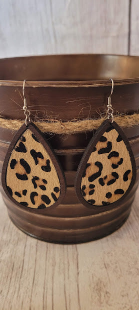 Tan Leopard Wood Teardrop Earrings  Dark brown wood Genuine leopard print leather Teardrop shape Silver fish hook Rubber earring back Whether you want to be on the wild side or classy this earring set it will add a fun touch to your outfit