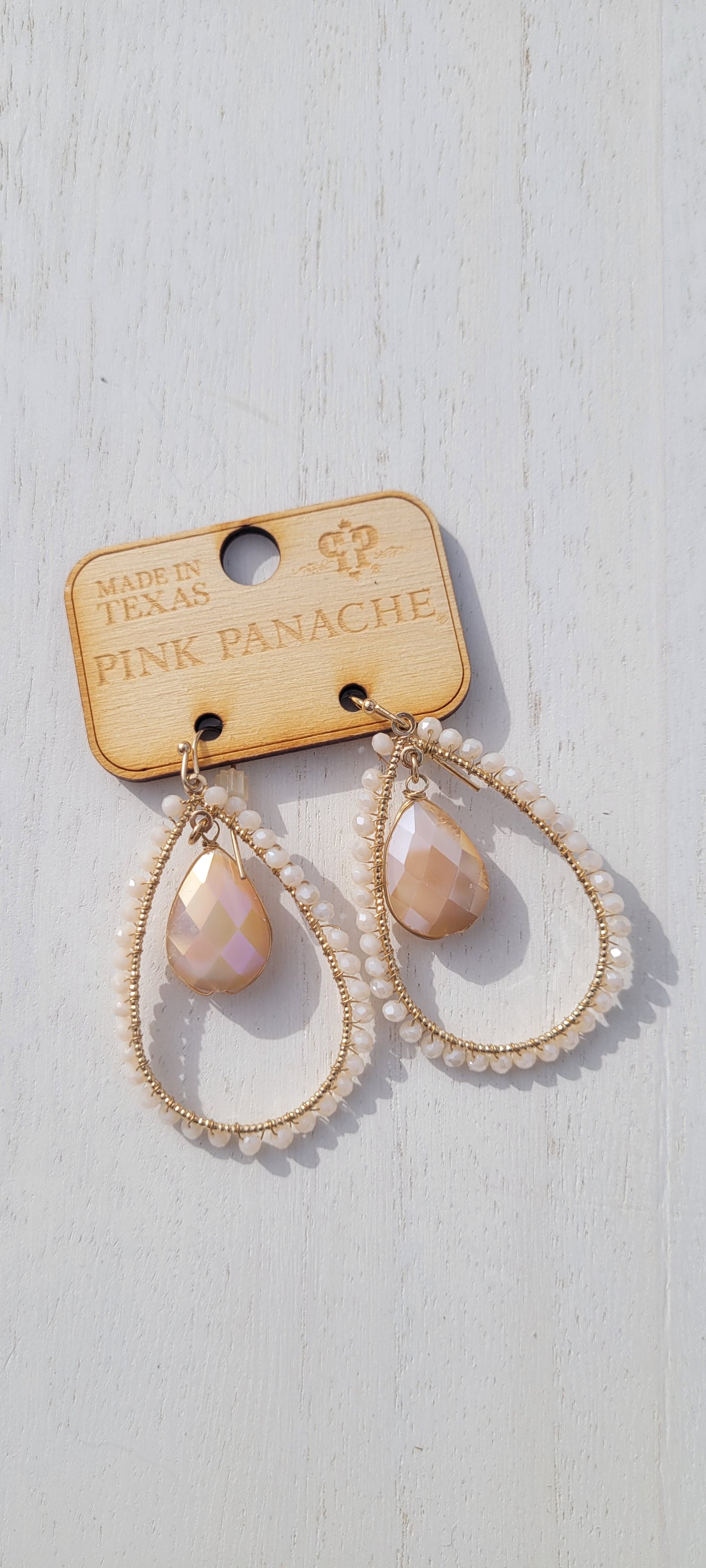Pink Panache Earrings Color: Ivory tone crystal bead wrapped teardrop earring with large faceted teardrop charm Limited supply!  